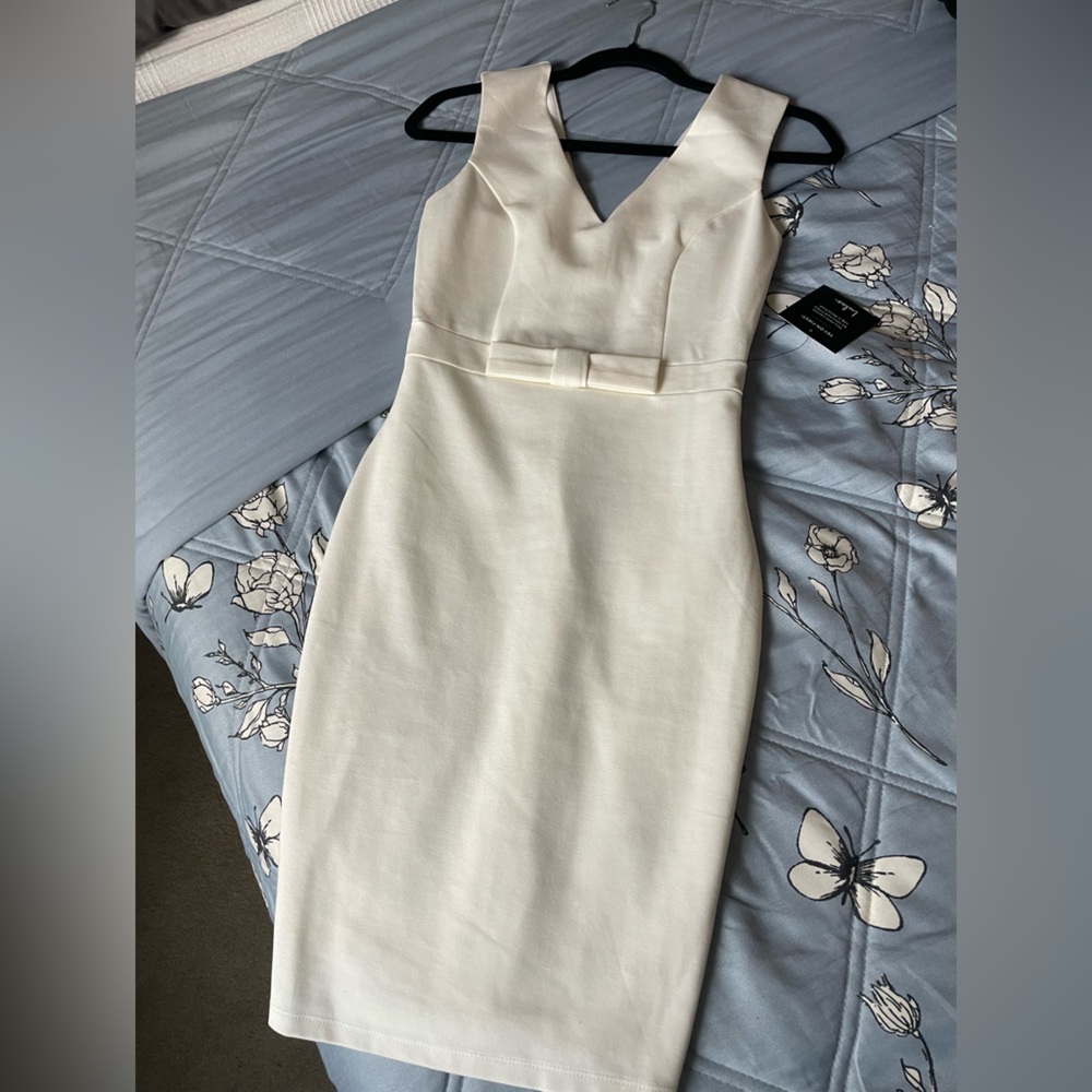 Lulu's Ivory Sleeveless Dress with Bow Accent